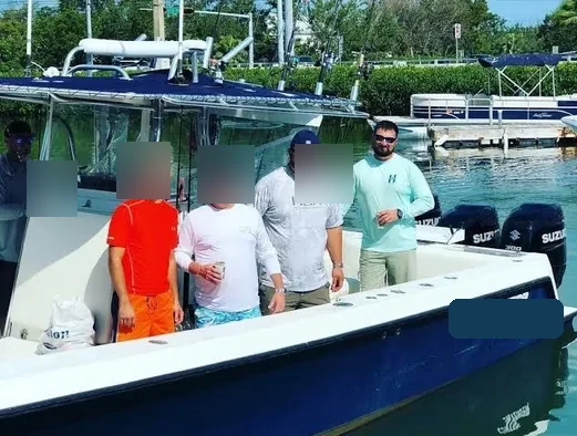 Privacy-protected Florida workers compensation fishing charter investigation vessel photograph